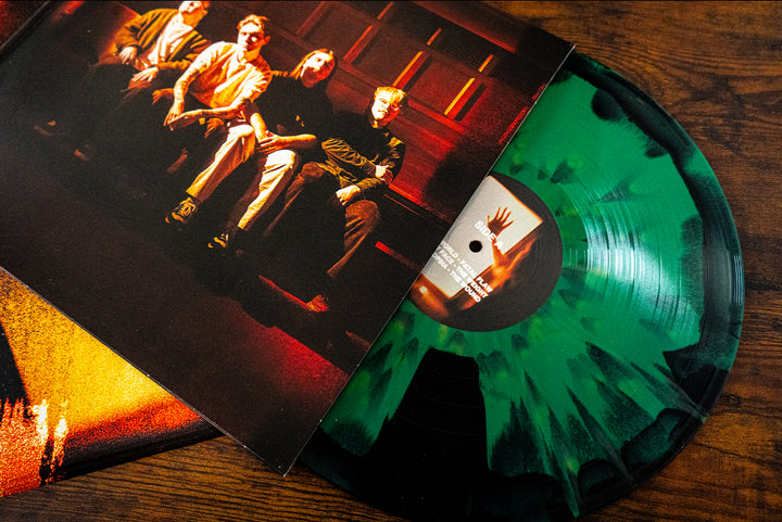 There’s A Whole World Out There - Evergreen/Black Aside/Bside with Gold Splatter LP