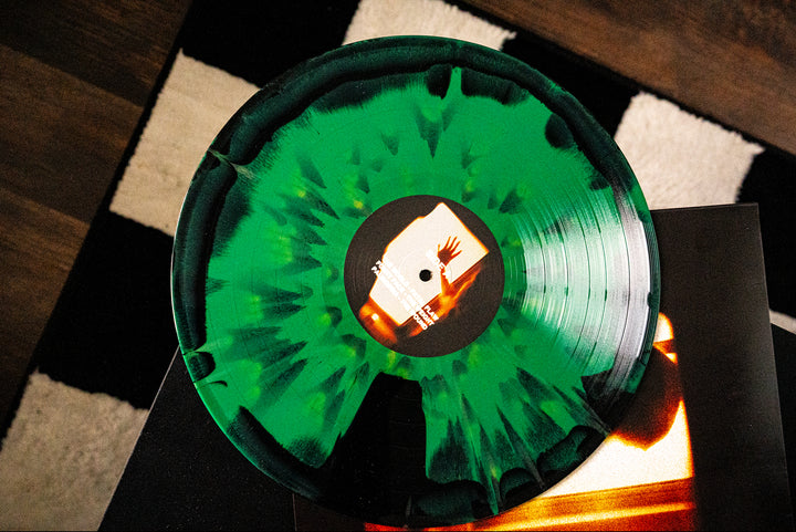 There’s A Whole World Out There - Evergreen/Black Aside/Bside with Gold Splatter LP