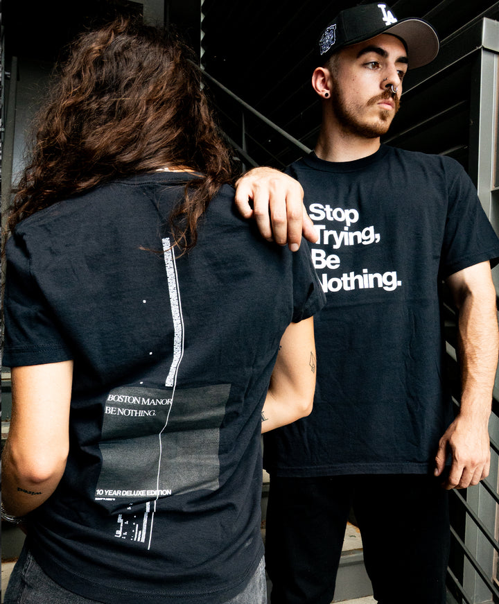 Stop Trying Be Nothing Black T-Shirt