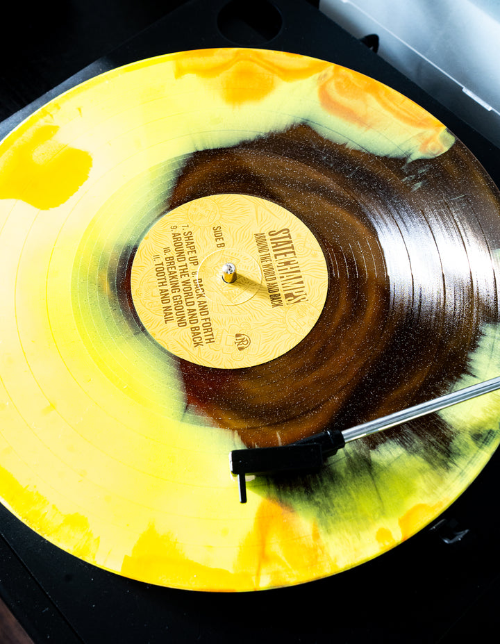 Around The World And Back (10 Year Deluxe Edition) - Orange, Yellow and Black ice with Glitter LP
